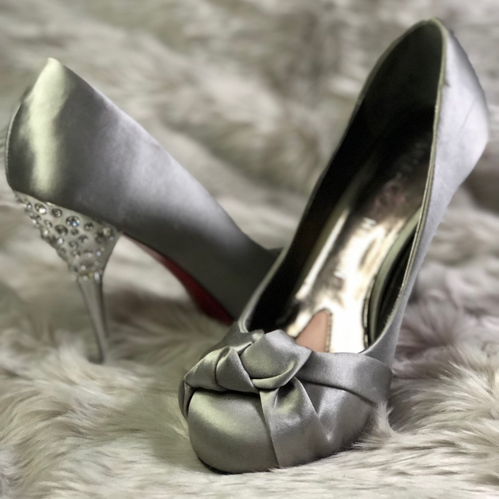 Paris Hilton silver pumps